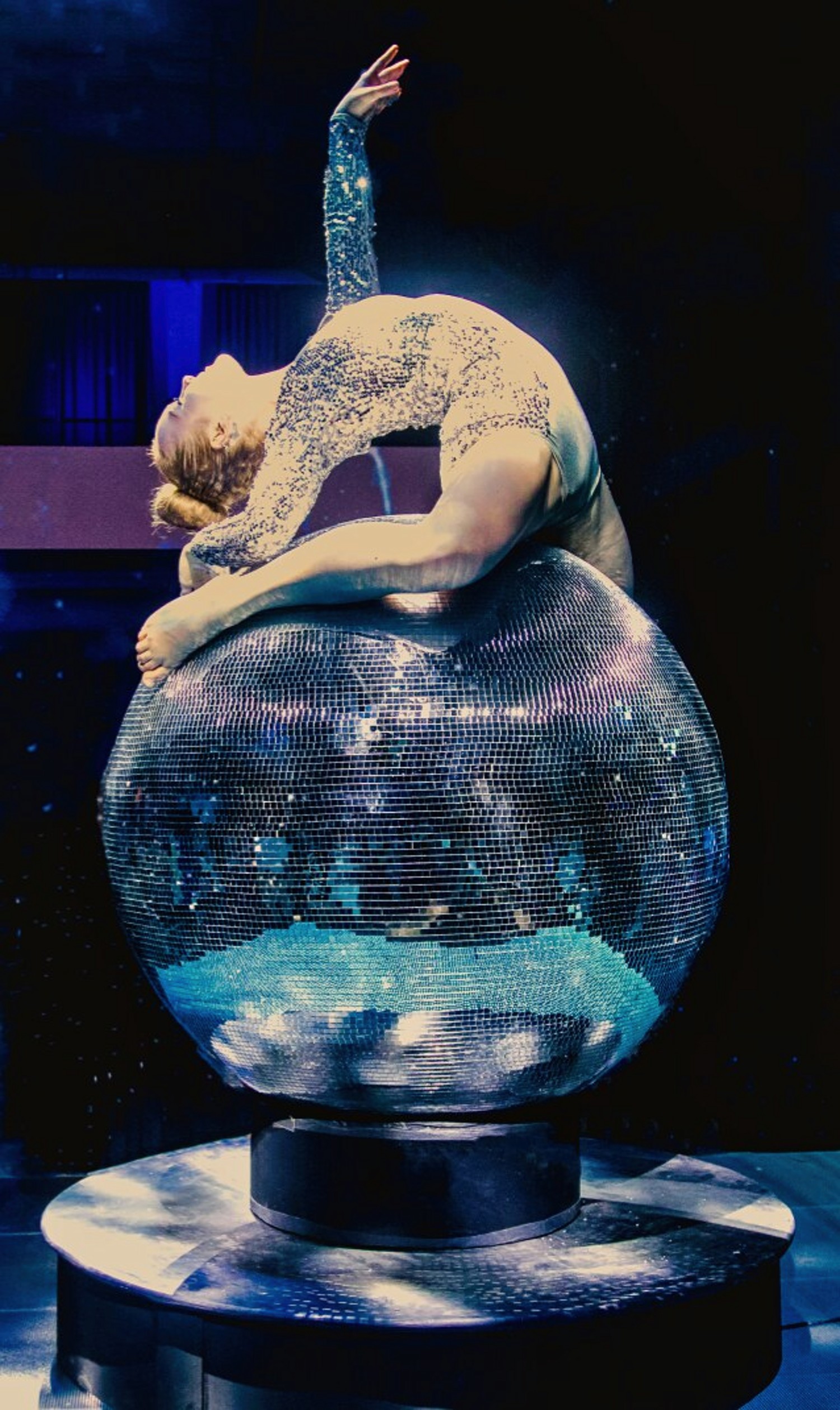Contortionist on mirror ball